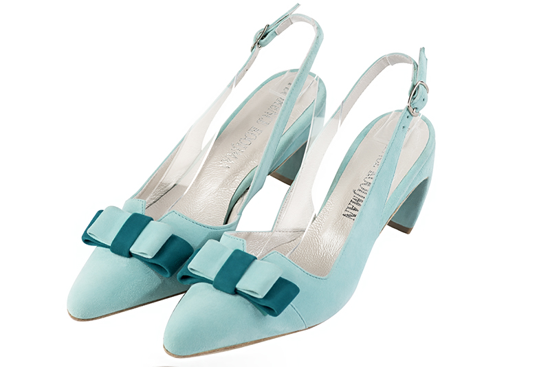 Aquamarine blue women's open back shoes, with a knot. Tapered toe. Medium comma heels. Front view - Florence KOOIJMAN